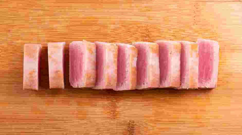 Tuna Tataki Recipe: Once the tuna is cool enough to handle, slice the tuna into thin ⅛ - ¼ inch pieces.