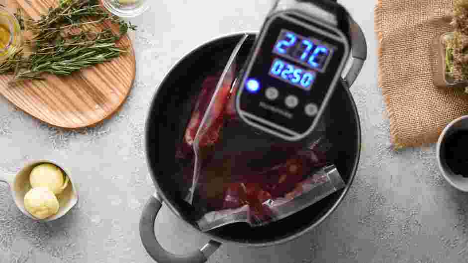 Sous Vide Filet Mignon Recipe: 
Submerge the vacuum-sealed filet mignon into the sous vide water bath.