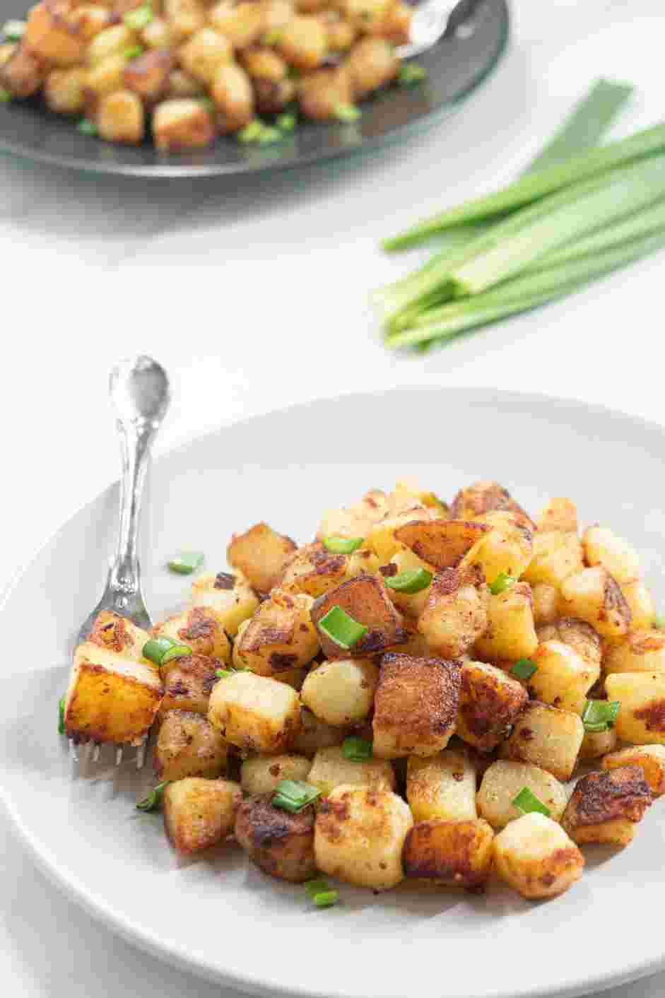 Skillet Breakfast Potatoes Recipe: Sprinkle with minced chives and serve.