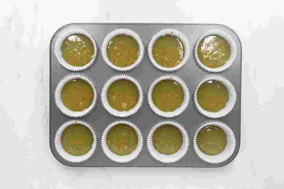 Matcha Cupcakes Recipe: 
Use a large scoop to divide the batter evenly into twelve muffin cups.