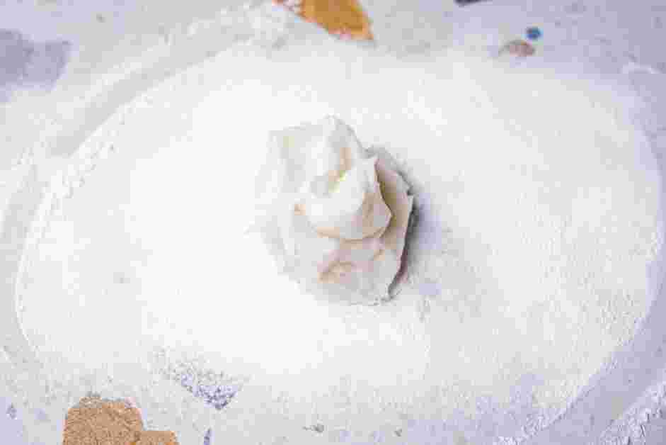 Strawberry Mochi Recipe:
Dust your work surface with the potato starch and place the mochi on top.