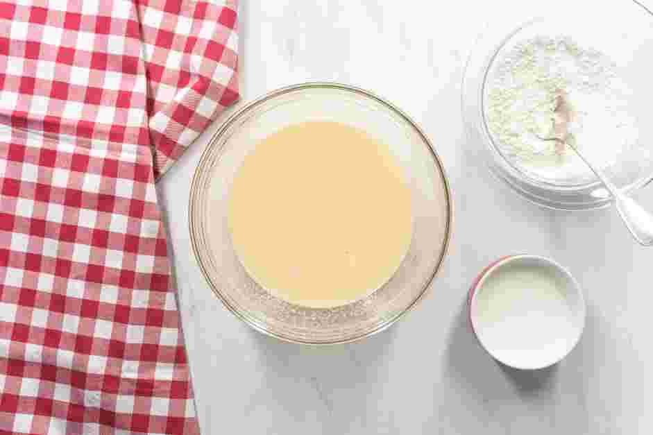 Strawberry Shortcake Cupcakes Recipe:
Add the melted butter and beat until incorporated, scraping the bottom and sides of the bowl.