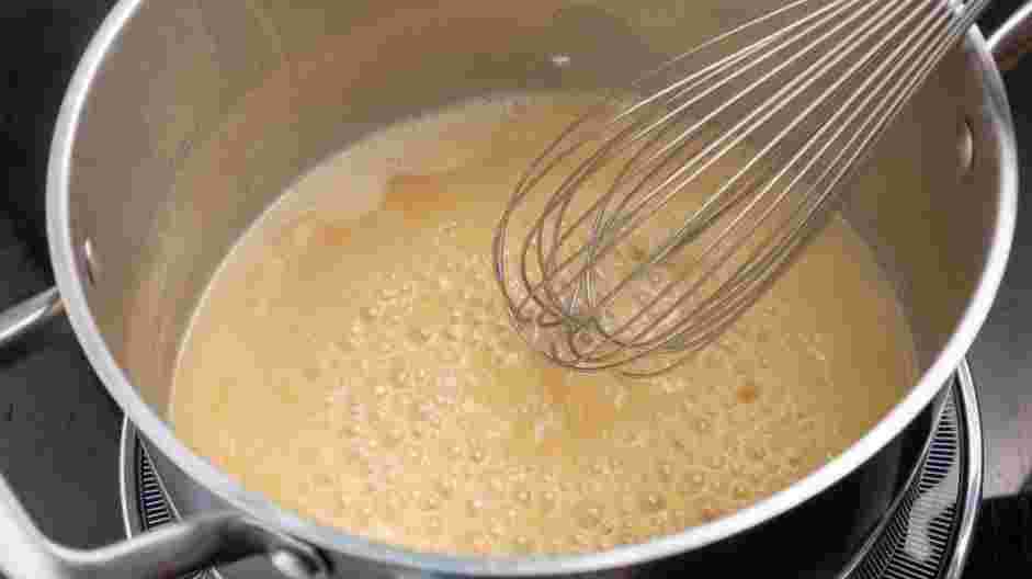 Broccoli and Cheese Rice Casserole Recipe:
Slowly whisk in the chicken broth, a large splash at a time, making sure a smooth sauce forms.