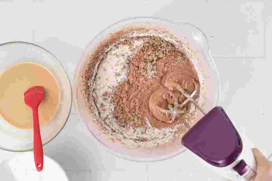 Chocolate Pound Cake Recipe: Decrease the mixer’s speed to low and add in the flour and buttermilk mixture in alternating additions, beginning and ending with the flour.