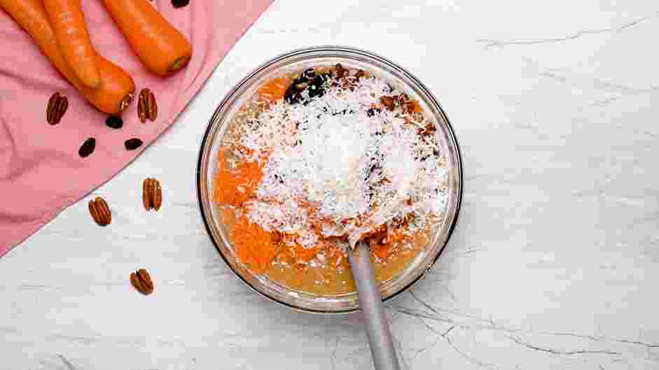 Carrot Cake Bundt Cake Recipe: Fold in shredded carrots, chopped pecans, raisins and shredded coconut.