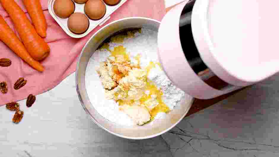 Carrot Cake Bundt Cake Recipe: While the cake cools, prepare the frosting.
