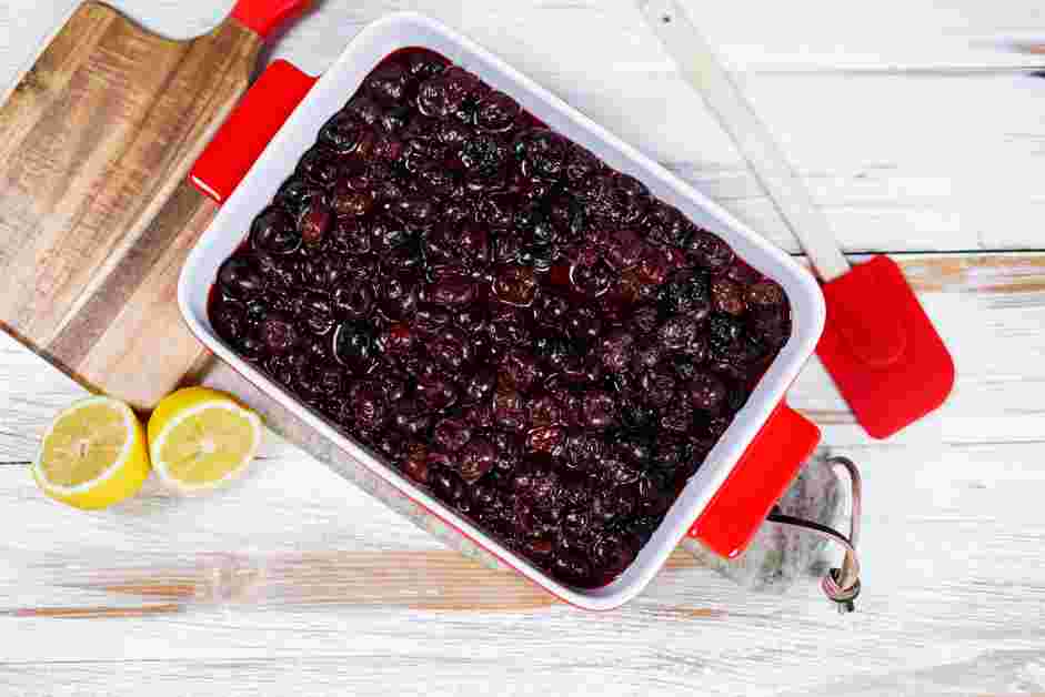 Cherry Cobbler Recipe: Transfer the cherry filling into an 8x11-inch baking dish.