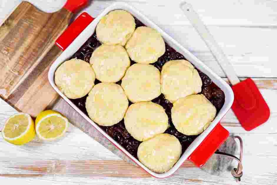 Cherry Cobbler Recipe: Use a pastry brush to lightly brush the flattened dough with the egg wash.