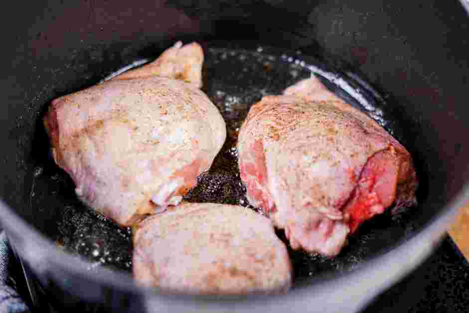 Chicken Gumbo Soup Recipe: In an eight-quart Dutch oven over medium-high heat, heat &frac14; cup of oil.