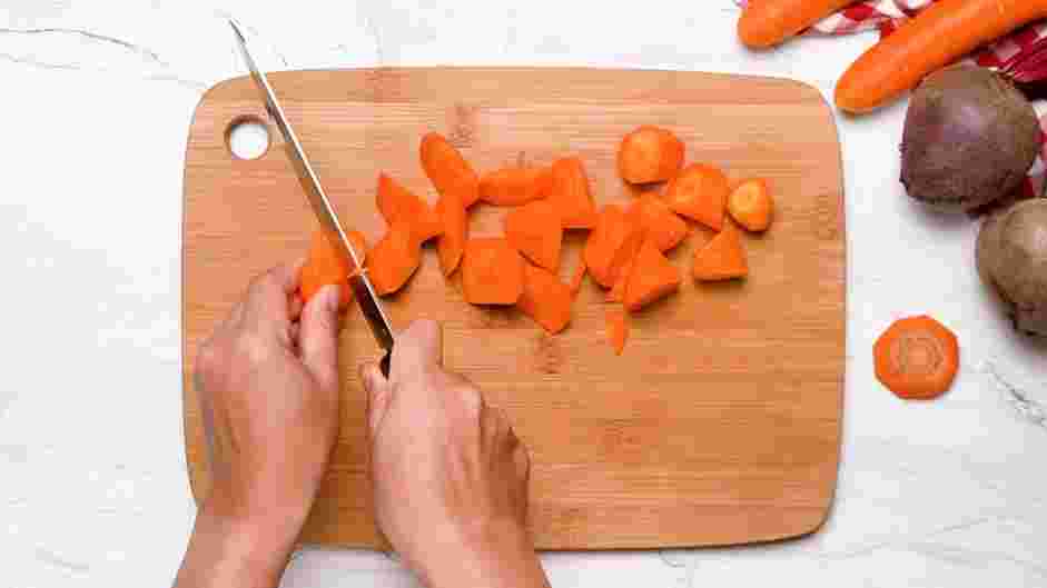 Roasted Beets and Carrots Recipe: 
Perform a roll cut by placing a carrot on the cutting board, parallel to the edge facing you.