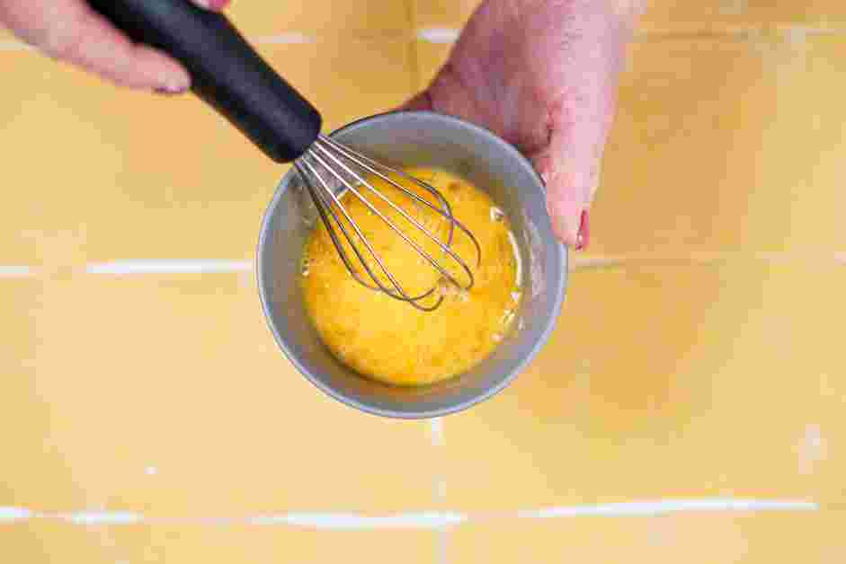 Spinach Ravioli Recipe: Prepare an egg wash by whisking the remaining egg until loose and well combined.