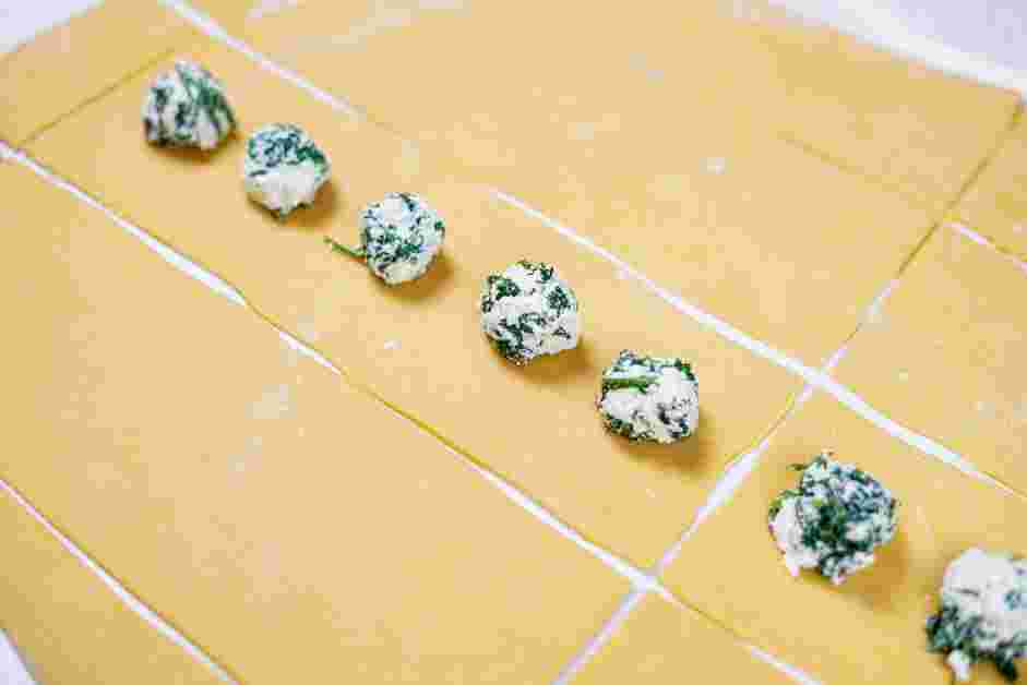 Spinach Ravioli Recipe:
Place ten 1 teaspoon mounds of the ricotta filling over the first layer of pasta.