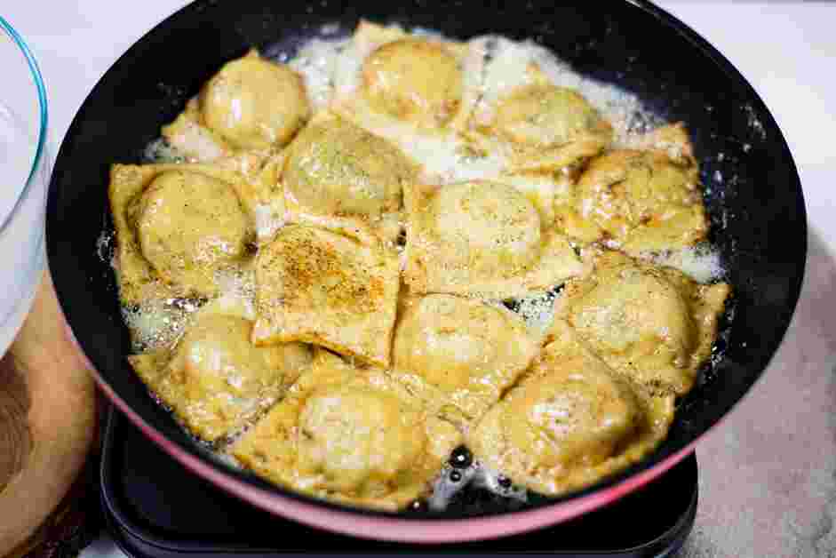 Spinach Ravioli Recipe: In a skillet, heat the butter and black pepper together.