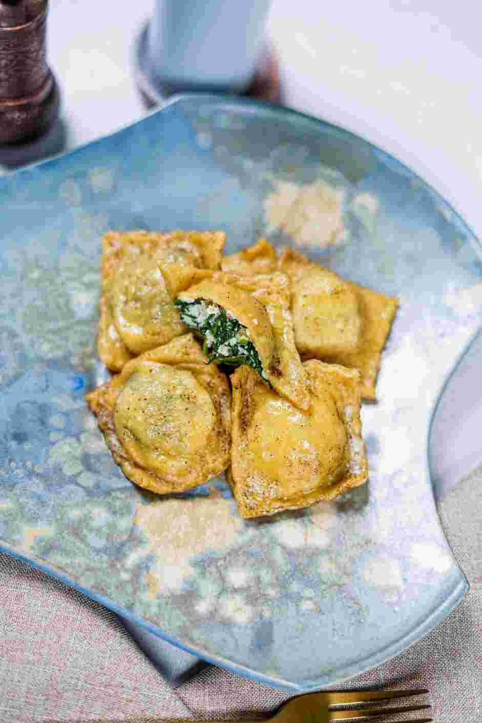 Spinach Ravioli Recipe:
Plate and serve, about six ravioli per serving.