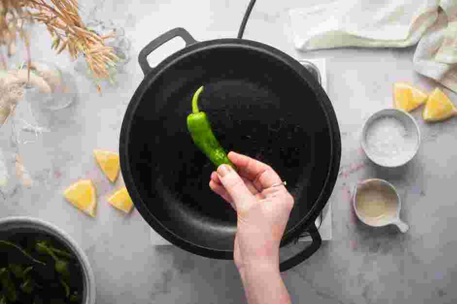 Blistered Shishito Peppers Recipe: Heat a cast-iron pan over high heat for 5 minutes.