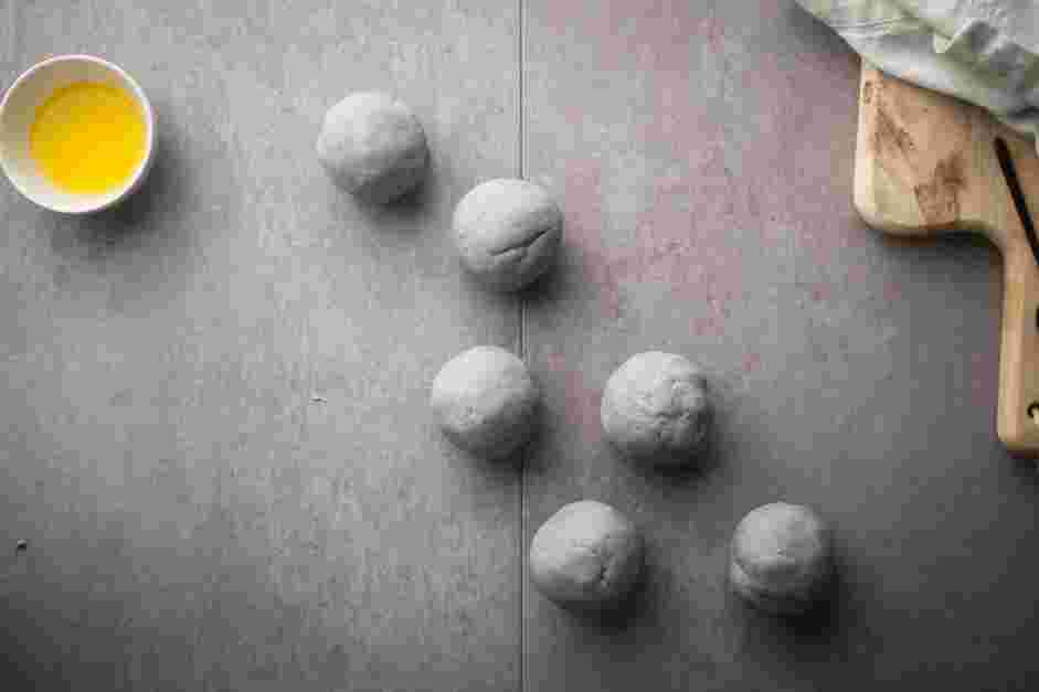 Blue Corn Tortillas Recipe: Divide and shape the dough into six golf-sized balls and cover it with a damp kitchen towel.
