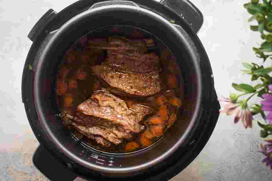 Instant Pot Short Ribs Recipe: When the timer goes off, allow the pressure to release naturally for 15 minutes before quick-releasing the pressure.