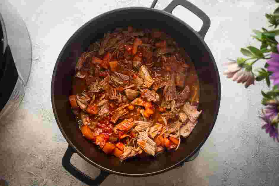 Instant Pot Short Ribs Recipe: Bring the mixture to a boil and then simmer to reduce the sauce.