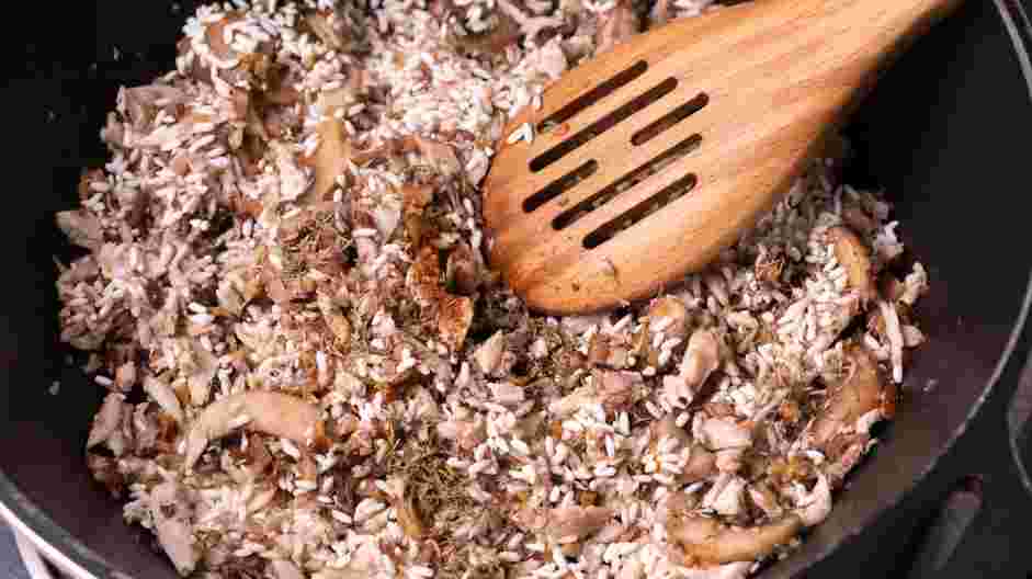 Chicken Mushroom Risotto Recipe:
Add the arborio rice, grated nutmeg and dried thyme to the pot and mix generously.