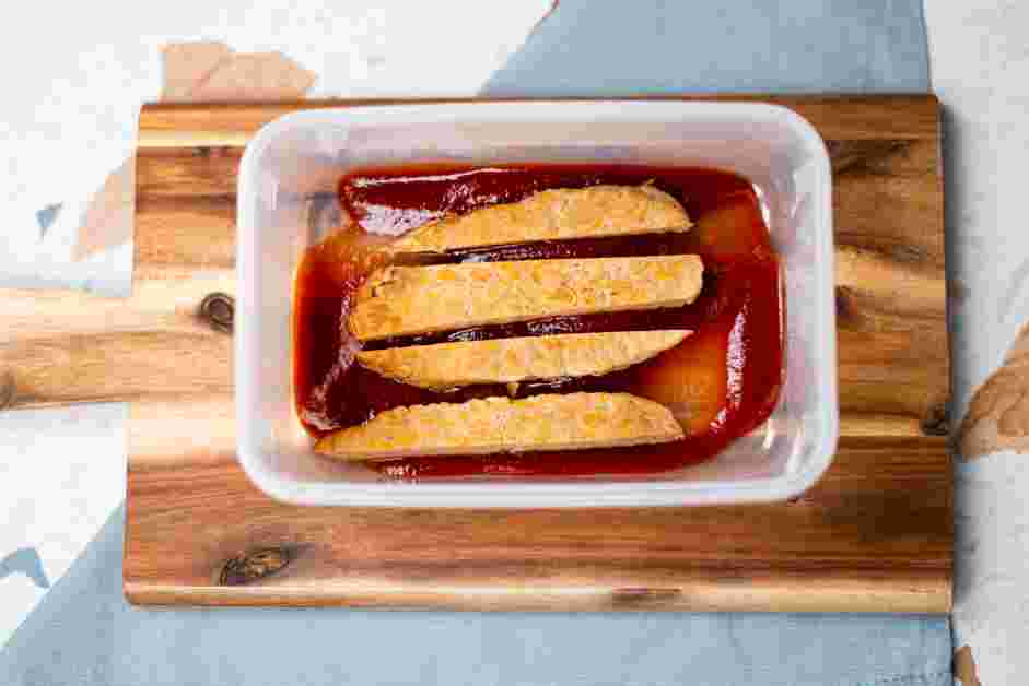 Tempeh Bacon Recipe:
Slice the tempeh into thin, bacon-like strips.