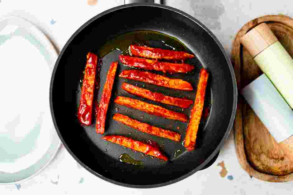 Tempeh Bacon Recipe: In a nonstick skillet, add some avocado oil and pan fry on each side for 2-3 minutes or until the tempeh is golden brown.