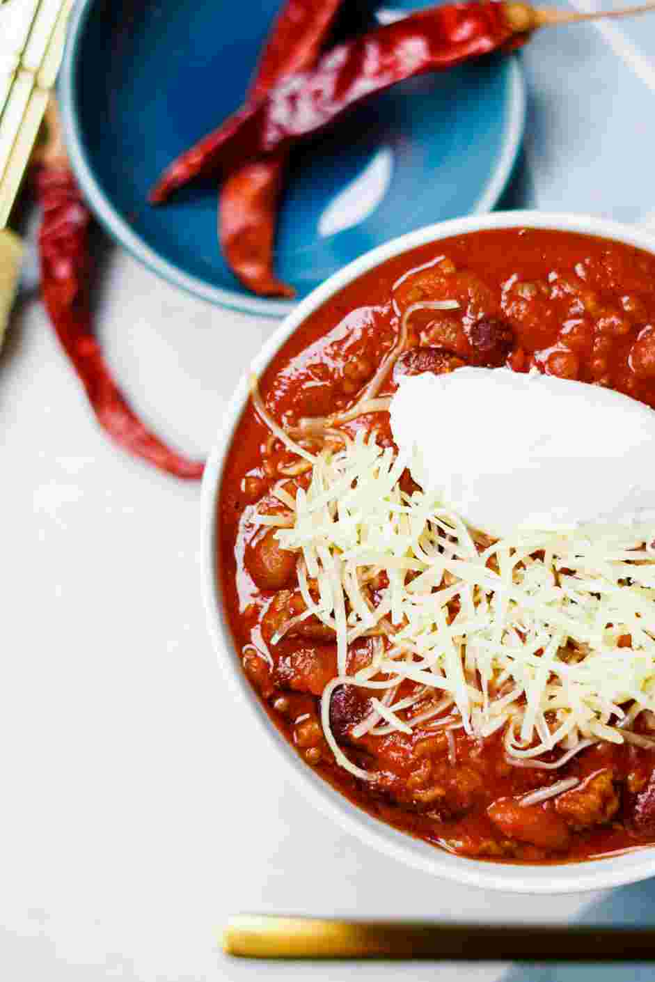 Red Chili Recipe: 
Ladle the chili into bowls and top with creme fraiche and shredded cheddar cheese.