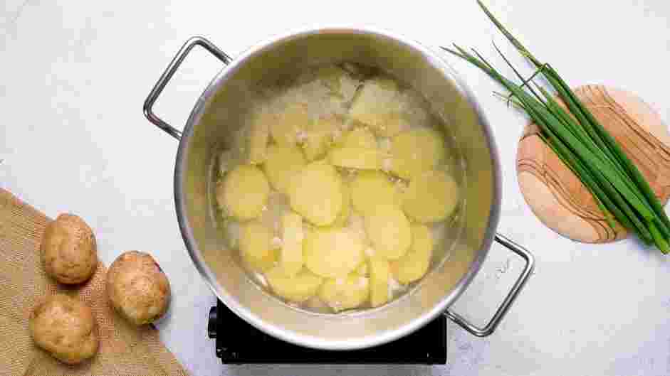 Mashed Potatoes with Sour Cream Recipe: In a large saucepan or Dutch oven, bring the 2 quarts of salted water to a boil.