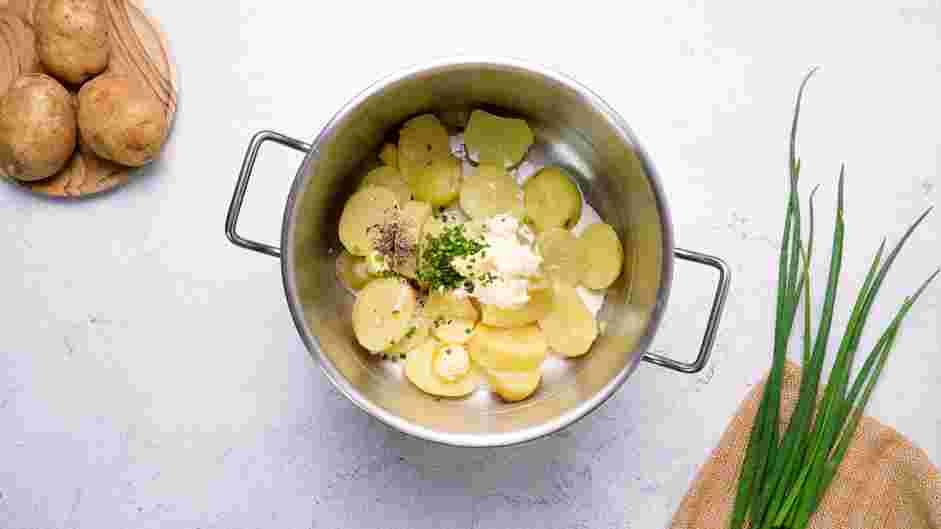 Mashed Potatoes with Sour Cream Recipe: 
Drain the water from the saucepan leaving the potatoes.