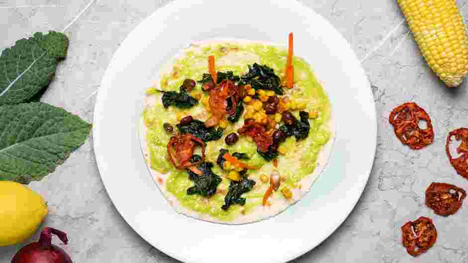 Raw Wraps Recipe: Top the mashed avocado with the massaged kale.
