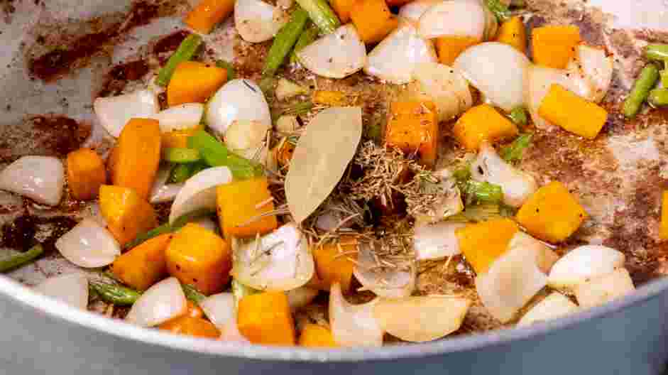 Short Rib Ragu Recipe: Add the herbs and bay leaf.