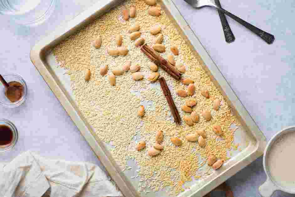 Agua de Horchata Recipe: Transfer the baking pan into the oven and toast the mixture until lightly golden brown, about 10-15 minutes.