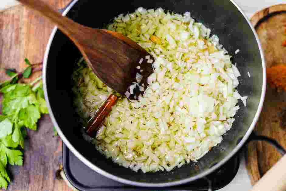 Andhra Chicken Curry Recipe: Add the chopped onions and saut&eacute; until translucent.