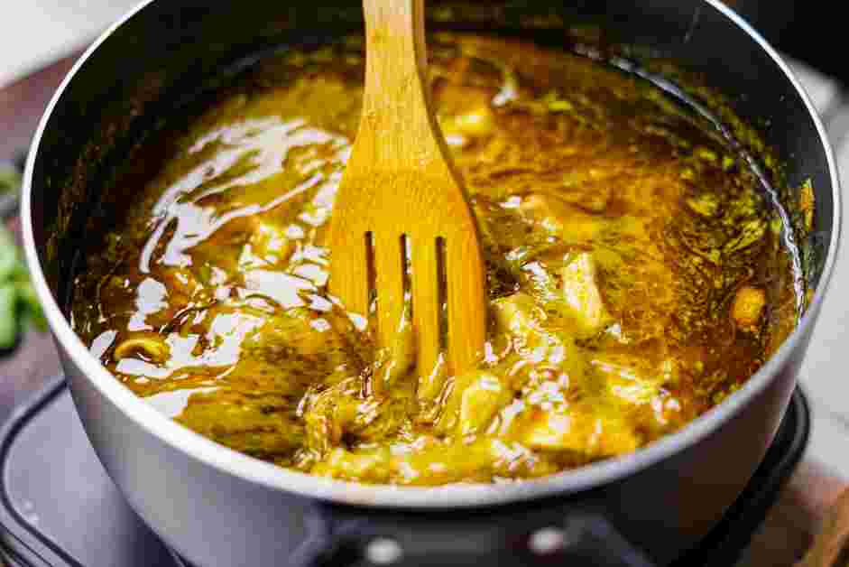 Andhra Chicken Curry Recipe: Cover the pot with the lid and reduce the heat to low.