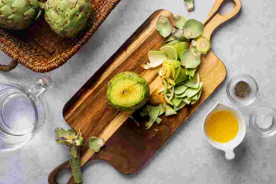 Instant Pot Artichokes Recipe: Trim the artichoke of the fibrous stems.