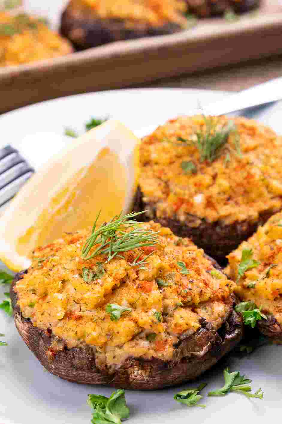 Crab Stuffed Portobello Mushrooms Recipe: 
Sprinkle old bay seasoning on top and serve with lemon wedges.