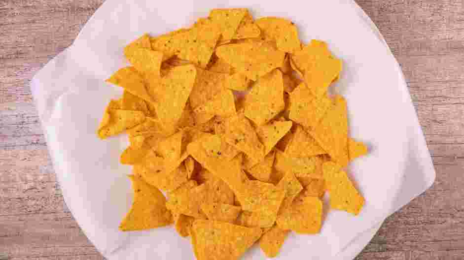Pulled Pork Nachos Recipe: Preheat the oven to 400°F.