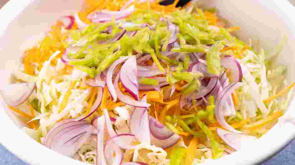 Pulled Pork Sliders Recipe: Make the crunchy coleslaw.
