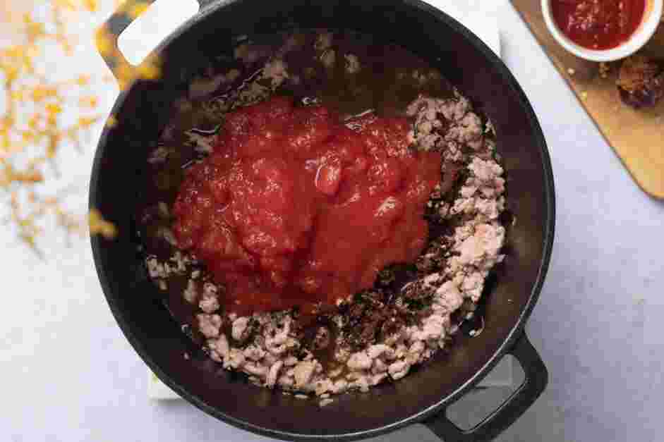 Stovetop Chili Recipe: Return the meat-vegetable mixture to the stove over medium heat.