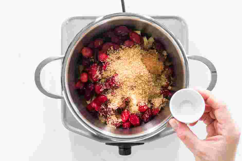 Apple Cranberry Sauce Recipe: In a saucepan over medium-low heat, add the diced apple, cranberries, brown sugar, cinnamon and salt.