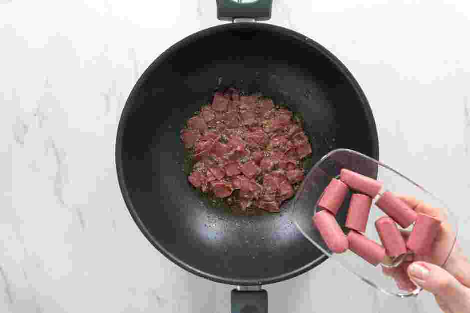 Potato Stew Recipe: In a pot over low heat, add the olive oil and bacon.
