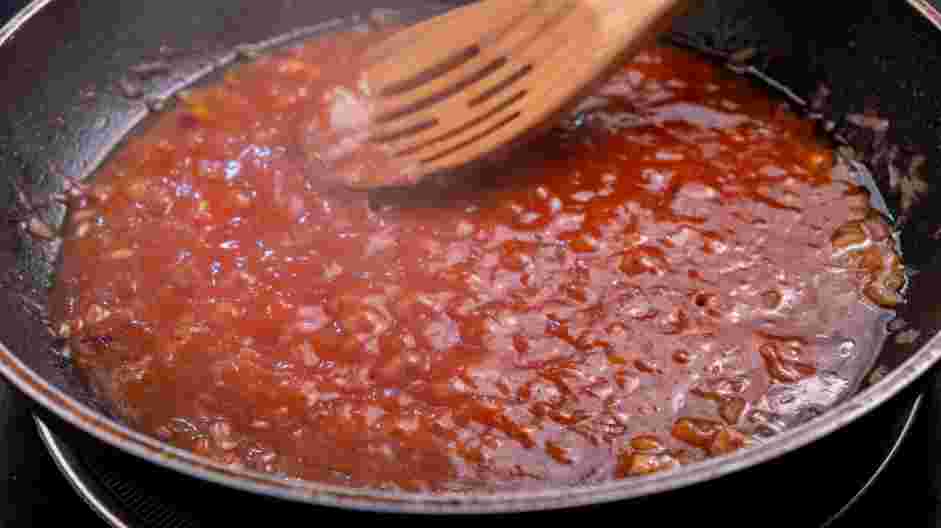 BBQ Chicken Sandwich with Napa Slaw Recipe: Add the remaining two teaspoons of chili powder, tomato sauce, vinegar, sugar, salt and pepper.