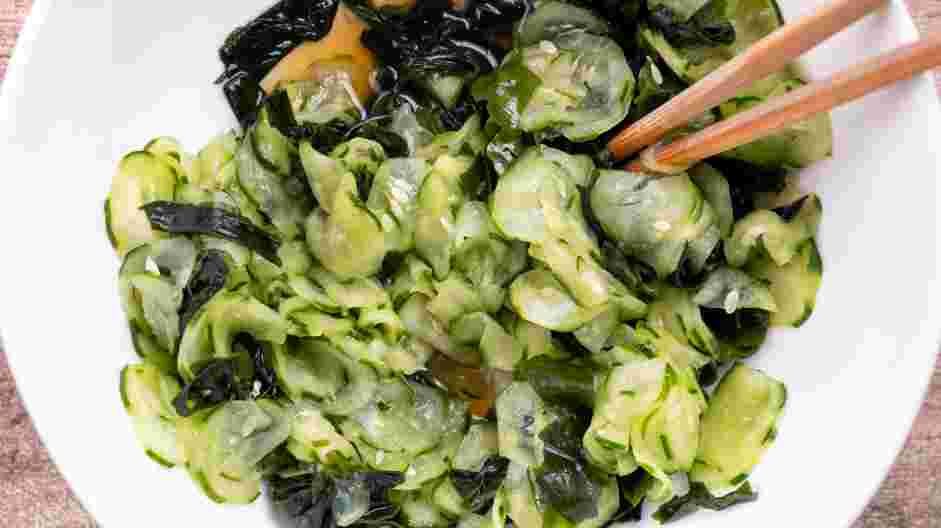 Japanese Cucumber Salad Recipe: Transfer the wakame seaweed and cucumber into the bowl with the dressing.