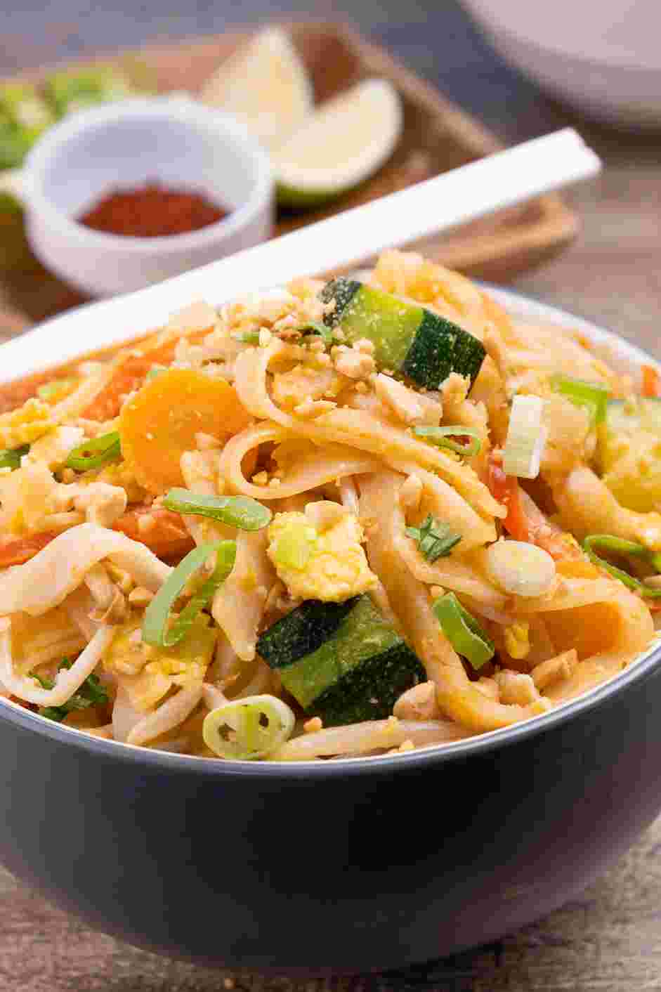 Vegetarian Pad Thai Recipe: Top the vegetarian pad thai with chopped peanuts, thinly sliced green onions and chopped cilantro.