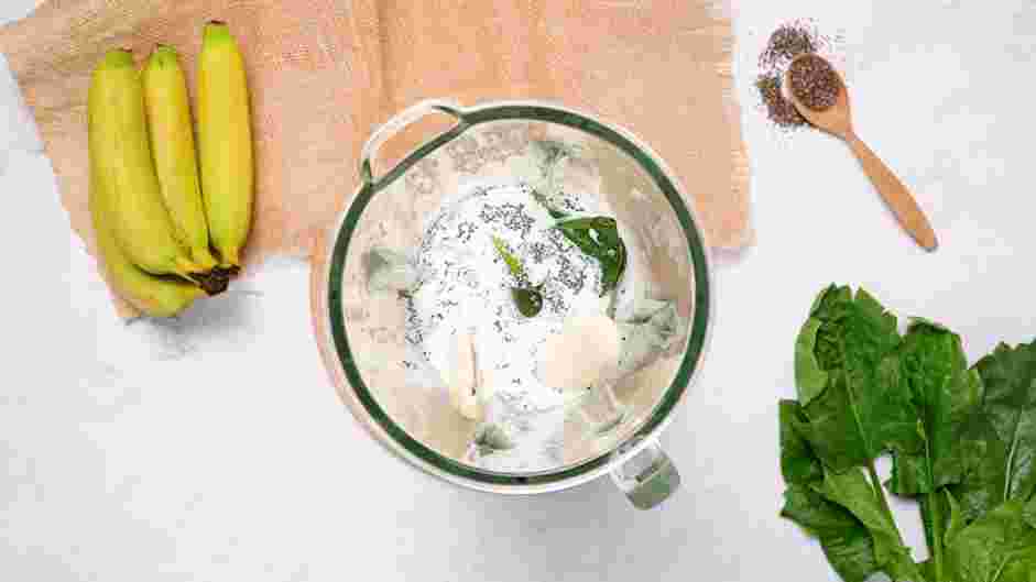 Chia Seed Smoothie Recipe: In the jar of a blender, place the milk, spinach, chia seeds, date, avocado and banana.