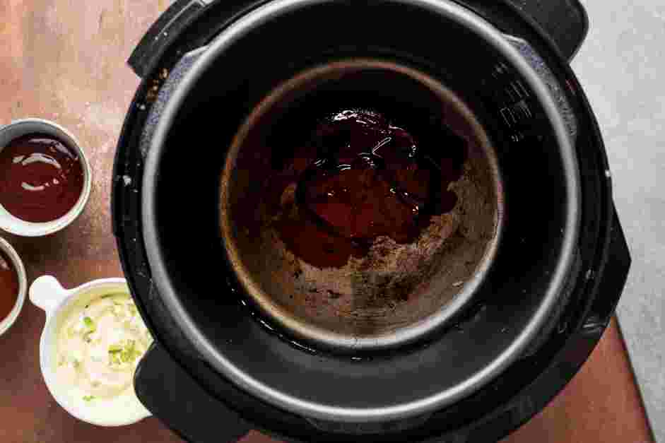 Instant Pot BBQ Chicken Recipe:
In the pot of the Instant Pot, whisk together 1 cup of water, ½ cup of barbecue sauce and liquid smoke, if using.