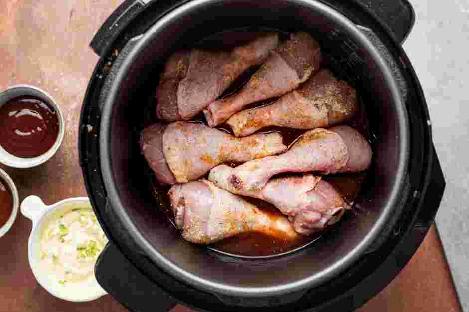 Instant Pot BBQ Chicken Recipe: Add the pieces of seasoned chicken into the pot.