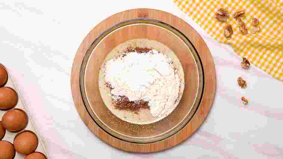 Walnut Brownies Recipe: Add the cocoa powder, flour, salt and baking powder into the bowl.