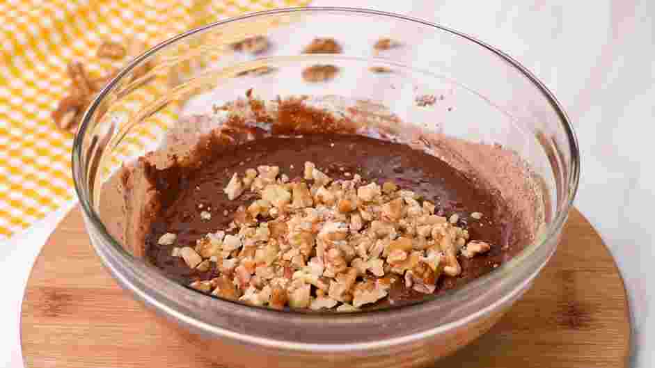 Walnut Brownies Recipe: Gently fold in ¾ cup of the walnuts, being careful to not over-stir the brownie batter.