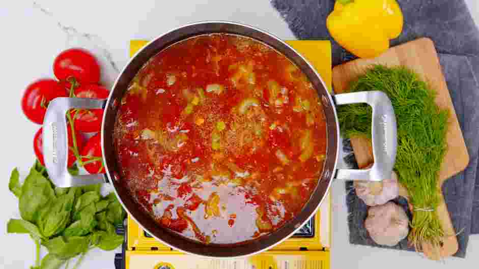 Garden Vegetable Soup with Pesto Recipe: Stir in the chicken broth, tomatoes and a pinch of salt and pepper.