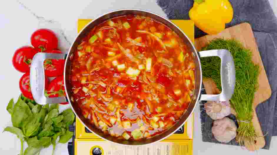 Garden Vegetable Soup with Pesto Recipe: Stir in the cabbage, zucchini, and beans.